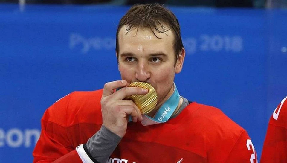 Андрей Зубарев и его золотая медаль. Фото: Reuters