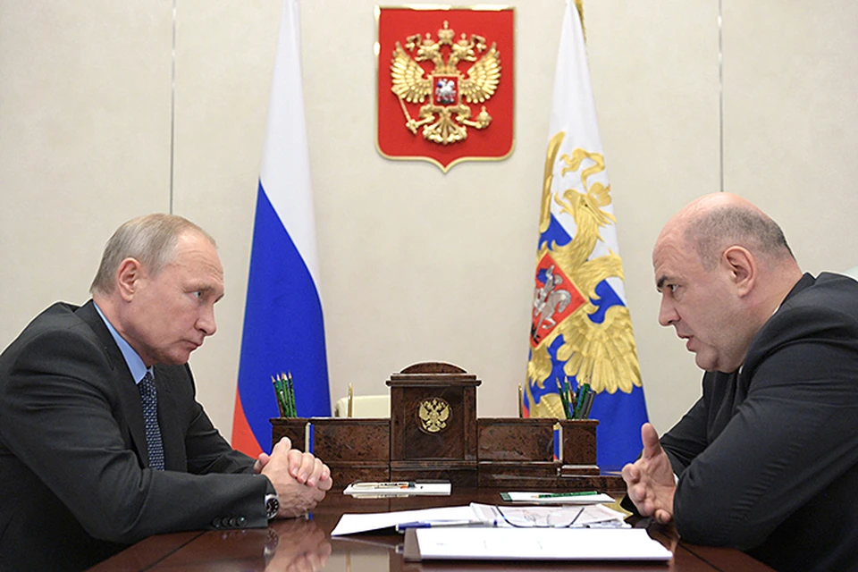 Президент РФ Владимир Путин и руководитель Федеральной налоговой службы РФ Михаил Мишустин. Фото: Алексей Дружинин/ТАСС