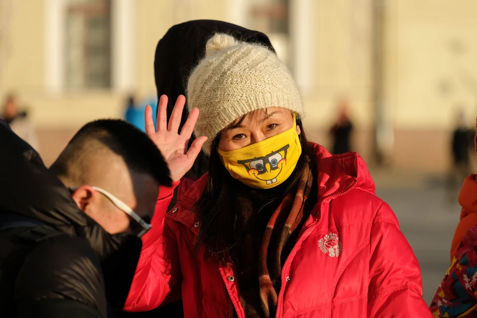 В России сейчас можно встретить множество граждан КНР, гулящих по нашим городам в масках.