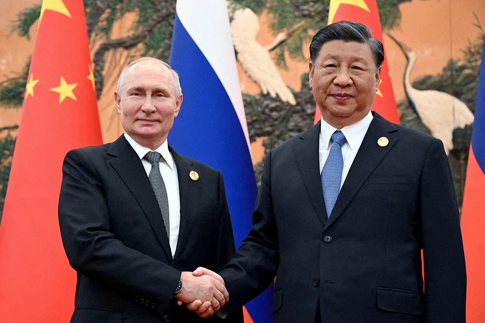 Владимир Путин и Си Цзиньпин во время встречи в Пекине.