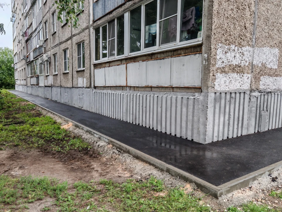 УК отремонтировала отмостку дома в Канавинском районе после вмешательства ГЖИ. Фото: Госжилинспекция Нижегородской области